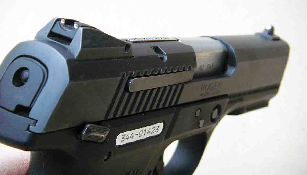 The pistol features snag-free, white-dot front and rear sights.